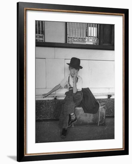 Little Boy Sitting on His Luggage While Waiting For the Train at the Denver Union Station-Sam Shere-Framed Photographic Print