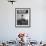 Little Boy Sitting on His Luggage While Waiting For the Train at the Denver Union Station-Sam Shere-Framed Photographic Print displayed on a wall