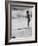 Little Boy Standing on a Surf Board Staring at the Water-Allan Grant-Framed Photographic Print