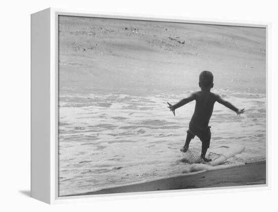 Little Boy Trying to Surf-Allan Grant-Framed Premier Image Canvas