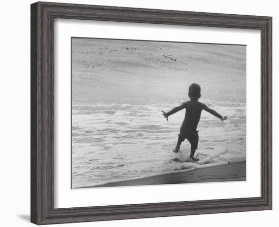 Little Boy Trying to Surf-Allan Grant-Framed Photographic Print