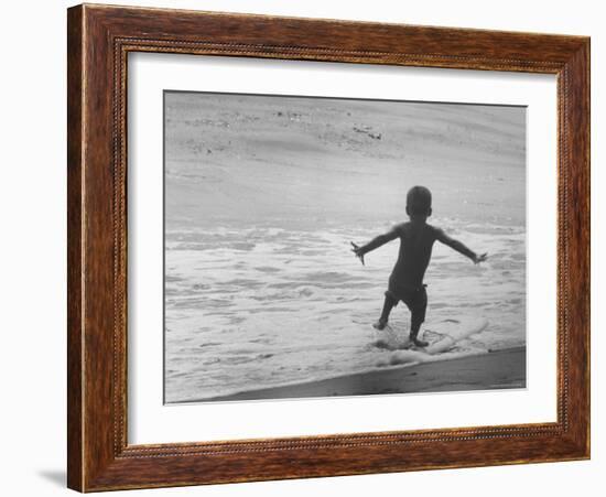 Little Boy Trying to Surf-Allan Grant-Framed Photographic Print