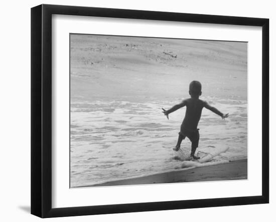 Little Boy Trying to Surf-Allan Grant-Framed Photographic Print