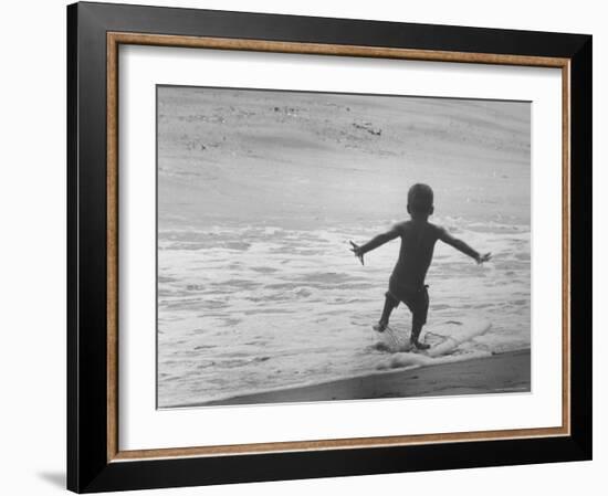 Little Boy Trying to Surf-Allan Grant-Framed Photographic Print