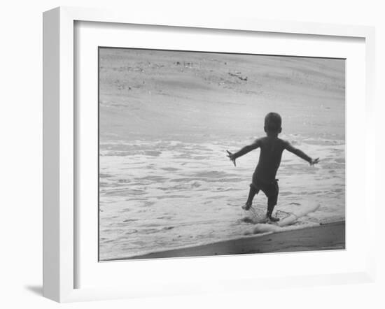 Little Boy Trying to Surf-Allan Grant-Framed Photographic Print