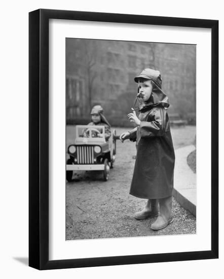 Little Boys at Play Wearing a Rainsuit-Nina Leen-Framed Photographic Print