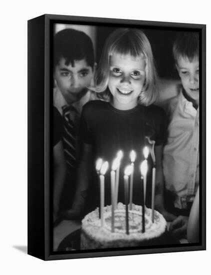 Little Girl Blowing Out Her Candles on Her Birthday Cake-Robert W^ Kelley-Framed Premier Image Canvas