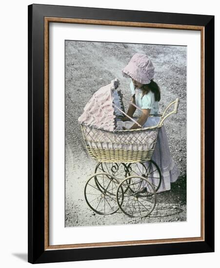 Little Girl Checking on Baby in Carriage-Nora Hernandez-Framed Giclee Print