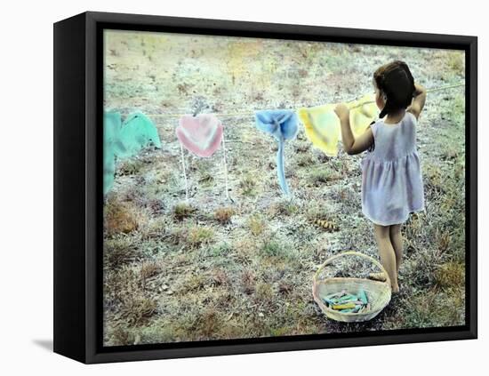 Little Girl Hanging Laundry-Nora Hernandez-Framed Premier Image Canvas