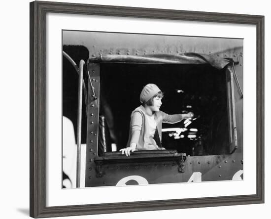 Little Girl in a Beret Driving a Train-null-Framed Photo