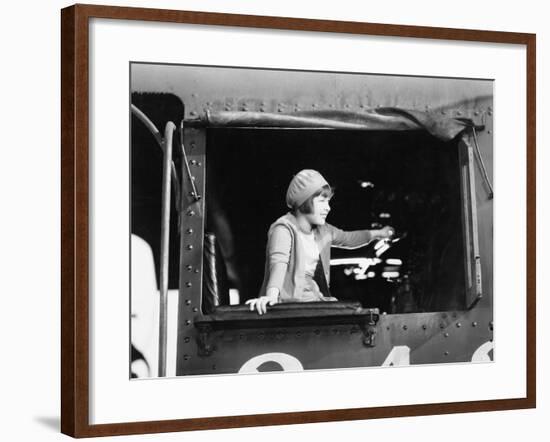 Little Girl in a Beret Driving a Train-null-Framed Photo