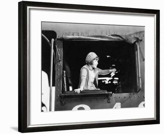 Little Girl in a Beret Driving a Train-null-Framed Photo