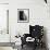 Little Girl in Hat and Coat Crouching Next to a Suitcase-null-Framed Photo displayed on a wall