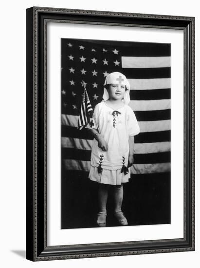 Little Girl in Nurses Outfit Holding US Flag-Lantern Press-Framed Art Print