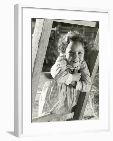 Little Girl Leaning on Ladder-null-Framed Photo