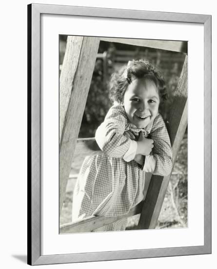 Little Girl Leaning on Ladder-null-Framed Photo