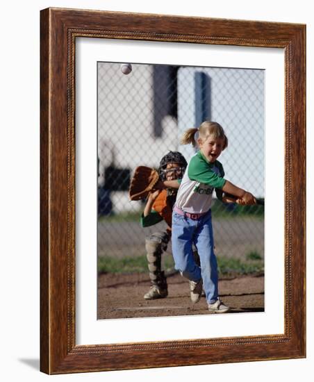 Little Girl Playing Softball-Bob Winsett-Framed Photographic Print