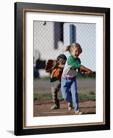 Little Girl Playing Softball-Bob Winsett-Framed Photographic Print