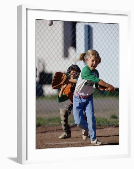 Little Girl Playing Softball-Bob Winsett-Framed Photographic Print