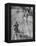Little Girl Riding Her Tricycle, Leading Francis the Mule-Allan Grant-Framed Premier Image Canvas