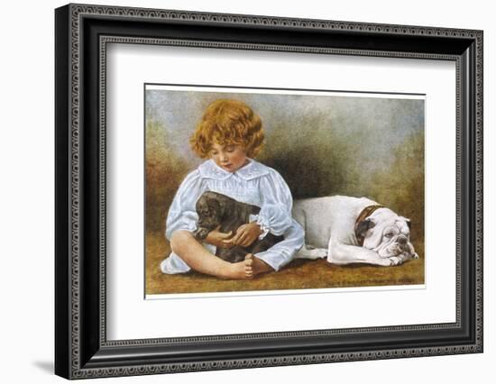 Little Girl Sits with a White Bulldog and Cuddles a Puppy-null-Framed Photographic Print