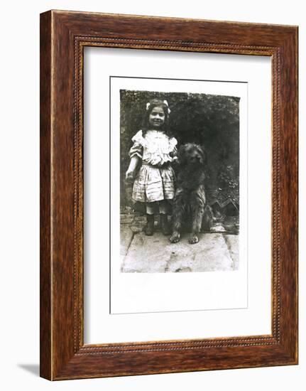 Little Girl with a Dog in a Garden-null-Framed Photographic Print