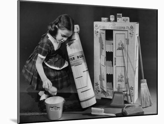 Little Girl with a Toy House Cleaning Kit-Walter Sanders-Mounted Photographic Print
