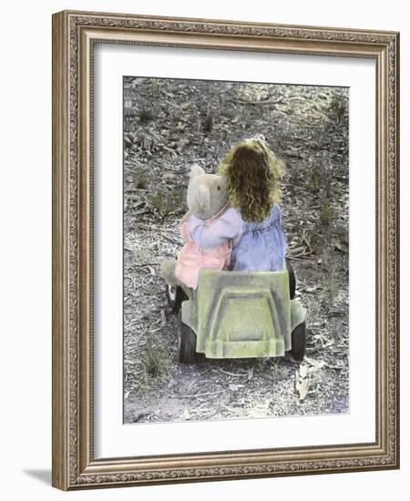 Little Girl with Her Teddy Bear Riding in a Toy Car-Nora Hernandez-Framed Giclee Print