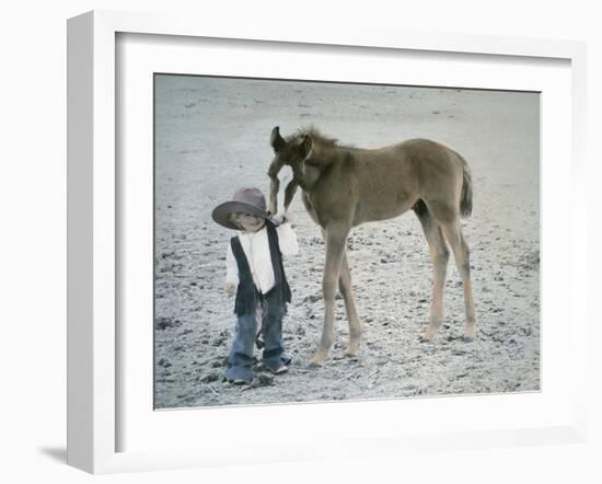 Little Kid Dressed Like Cowboy with Horse-Nora Hernandez-Framed Giclee Print