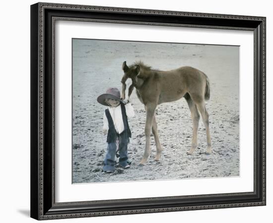 Little Kid Dressed Like Cowboy with Horse-Nora Hernandez-Framed Giclee Print