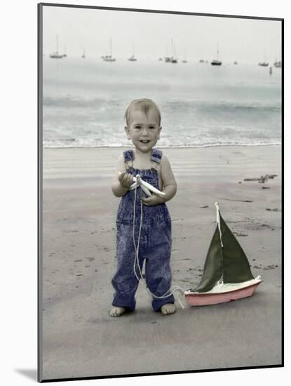 Little Kid on Beach with Toy Sailboat-Nora Hernandez-Mounted Giclee Print