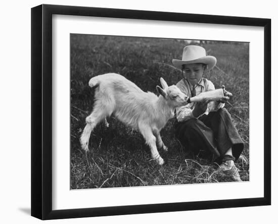 Little White Goat Being Fed from Bottle by Little Boy, at White Horse Ranch-William C^ Shrout-Framed Photographic Print