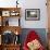 Living Room Interior with Open Fireplace and Floor to Ceiling Windows-PlusONE-Framed Photographic Print displayed on a wall