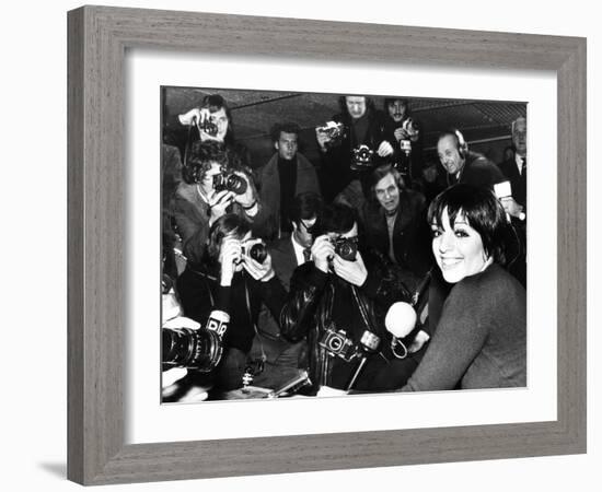 Liza Minnelli Is Surrounded by Photographers During an Airport News Conference in Paris-null-Framed Premium Photographic Print