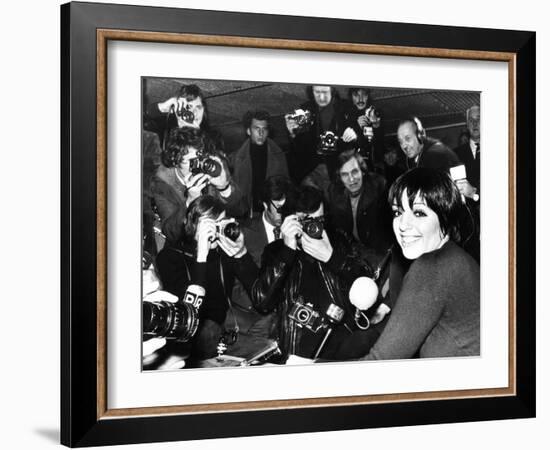 Liza Minnelli Is Surrounded by Photographers During an Airport News Conference in Paris-null-Framed Premium Photographic Print