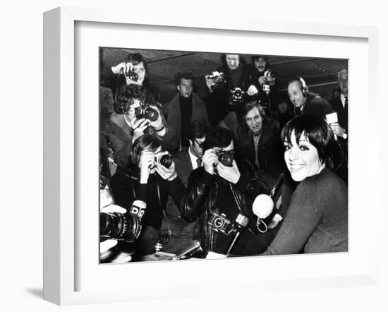 Liza Minnelli Is Surrounded by Photographers During an Airport News Conference in Paris-null-Framed Premium Photographic Print