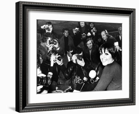 Liza Minnelli Is Surrounded by Photographers During an Airport News Conference in Paris-null-Framed Premium Photographic Print