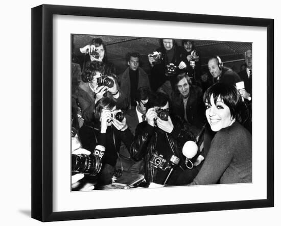 Liza Minnelli Is Surrounded by Photographers During an Airport News Conference in Paris-null-Framed Photo