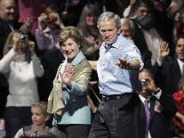 President Bush, Right, and First Lady Laura Bush Arrive for a Rally for Texas Governor Rick Perry-Lm Otero-Photographic Print