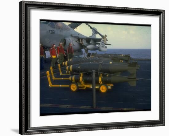 Loading Bombs onto US Navy A-6 Intruder Plane on Board Aircraft Carrier, in Mediterranean Sea-null-Framed Premium Photographic Print