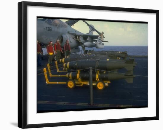 Loading Bombs onto US Navy A-6 Intruder Plane on Board Aircraft Carrier, in Mediterranean Sea-null-Framed Premium Photographic Print