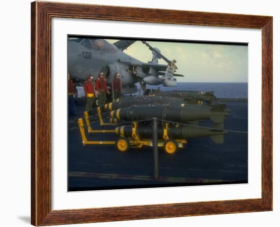 Loading Bombs onto US Navy A-6 Intruder Plane on Board Aircraft Carrier, in Mediterranean Sea-null-Framed Premium Photographic Print