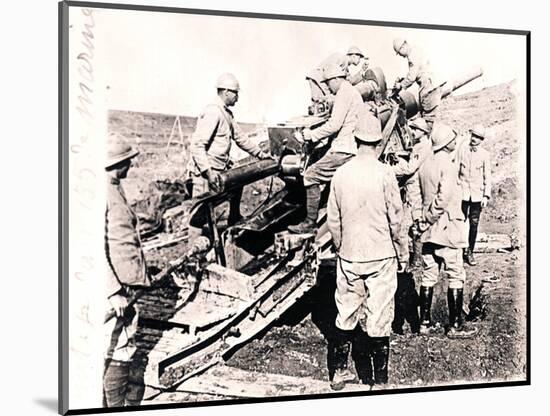 Loading shell into 155 mm gun, c1914-c1918-Unknown-Mounted Photographic Print