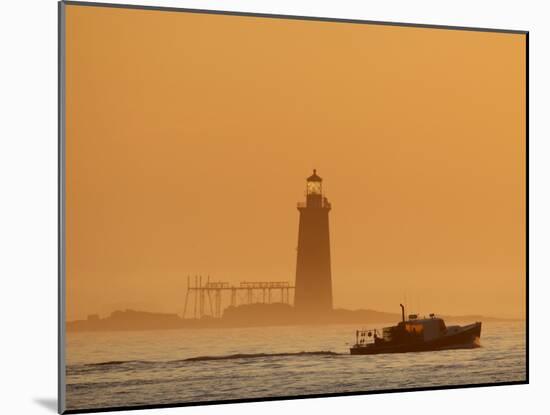 Lobster Boat Passes Ram Island Ledge Light at Dawn Off Cape Elizabeth, Maine-null-Mounted Photographic Print