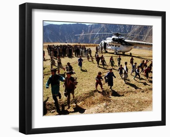 Local Children Run from a Helicopter-null-Framed Photographic Print
