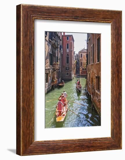 Local Gondaliers Row their Traditional Boat in One of Cannaregios Canals, Cannaregio, Venice-Cahir Davitt-Framed Photographic Print