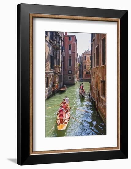 Local Gondaliers Row their Traditional Boat in One of Cannaregios Canals, Cannaregio, Venice-Cahir Davitt-Framed Photographic Print