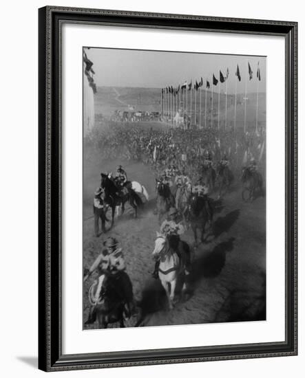 Local Sheriff's Posse Supplying Movie-like Touch to Jamboree at the "Avenue of Flags"-Ed Clark-Framed Photographic Print