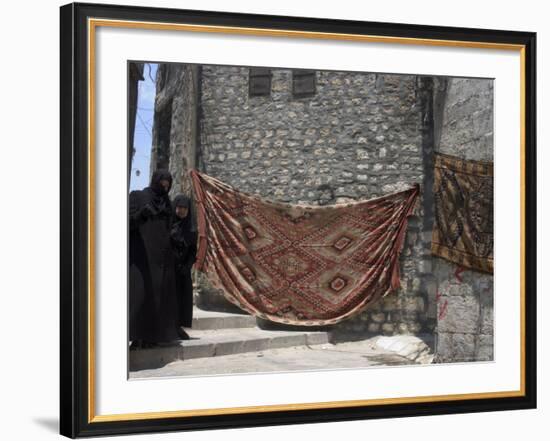 Local Woman Walking Down Steps, Blanket on Wall, Aleppo (Haleb), Syria, Middle East-Christian Kober-Framed Photographic Print