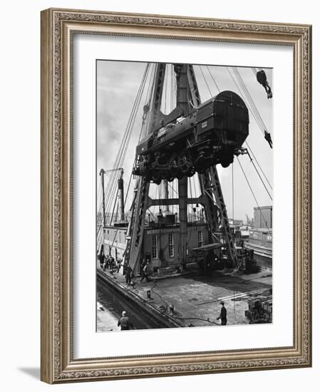 Locomotive Hoisted by Merritt-Chapman-Scott Crane Headed for France to Boost the Postwar Effort-Andreas Feininger-Framed Photographic Print